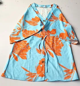 Summer casual floral print V-neck beach dress for women, stylish drawstring and button design.