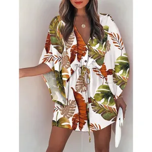 Tropical leaf print beach dress detail, V-neck drawstring waist and chic batwing sleeves.