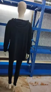 Black ribbed loose hoodie and trousers set, comfortable long-sleeve casual autumn wear.