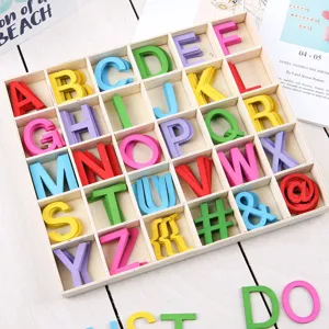 Colorful wooden alphabet letters in a storage box for DIY crafts and early education.