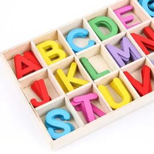 Colorful wooden alphabet letters set in wooden grid box for early childhood education