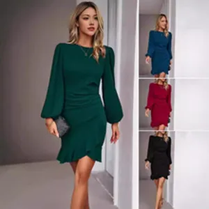 Detailed view of the elegant long-sleeve dress with lantern sleeves and ruffle hem design.