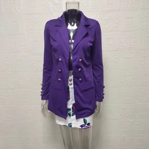 Detailed view of the elegant purple double breasted blazer and floral skirt set.