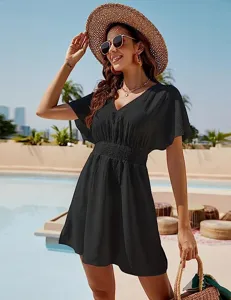 Stylish black v-neck summer beach dress for women, casual pleated short sleeve resort wear.