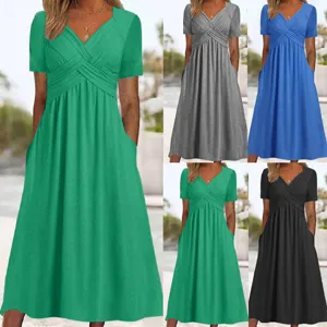 Detail view of women short sleeve v neck pleated midi dress with pockets in multiple colors.