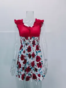 Abito estivo floreale bicolore con vita smock e girocollo da donna in stile casual da giorno.