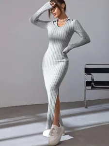 Detailed view of grey ribbed knit long-sleeve maxi dress with lapel collar and side split.