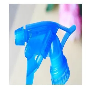 Blue plastic trigger spray nozzle replacement head for general watering bottles and household sprayers.