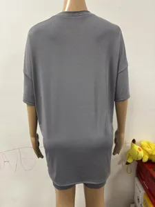 Back view detail of loose solid grey short sleeve top, comfortable casual homewear garment.