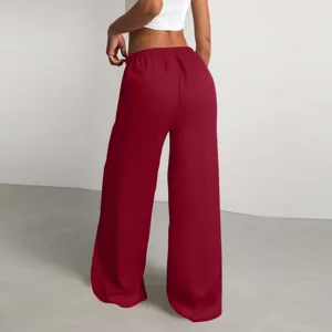 Pantaloni lunghi casual larghi da donna in tinta unita con tessuto testurizzato chic.