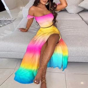 Detail view of the vibrant gradient off-shoulder crop top and high slit skirt two-piece set.
