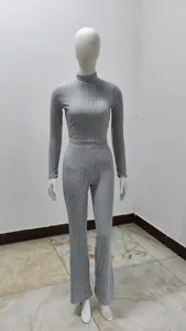 Grey ribbed long sleeve top and flared pants set detail view, comfortable knit fabric.