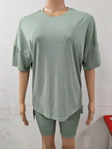 Summer casual solid color ribbed short sleeve top and biker shorts two piece set for women.