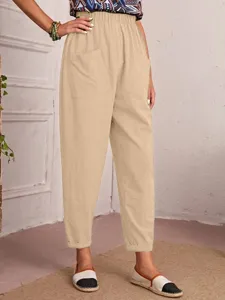 Khaki cotton casual cropped pants with elastic waist and practical side pockets.