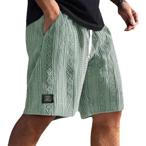 Men's casual green knitted textured shorts with drawstring and stylish patch for summer.