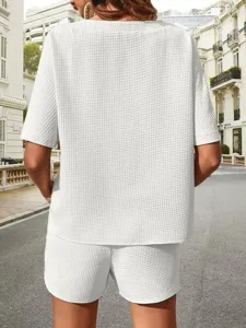 Back view details of women casual waffle knit two piece set short sleeve top and shorts.