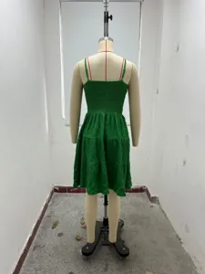 Summer green cami dress details, textured fabric, sleeveless tiered styling, casual wear.