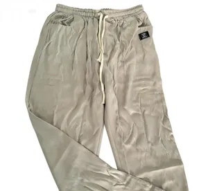 Casual loose mens trousers pocket detail and adjustable drawstring waistband closeup view