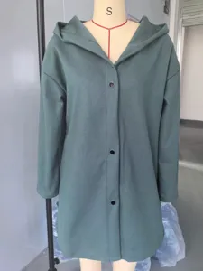 Solid color casual hooded jacket detail view showing front button design and soft fabric.