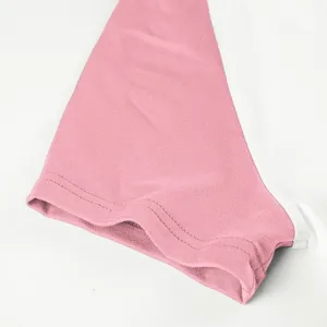Detail view of casual raglan color-block short sleeve top, comfortable basic fashion apparel.