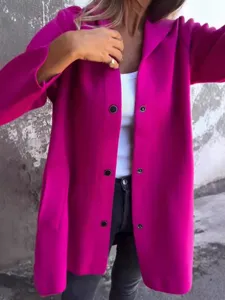 Casual magenta hooded jacket detail, featuring front snap buttons and comfortable fabric.