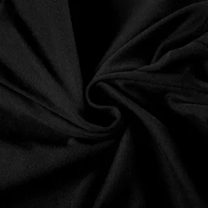 Black fabric detail close-up showcasing soft and stretchy texture for comfortable sportswear.