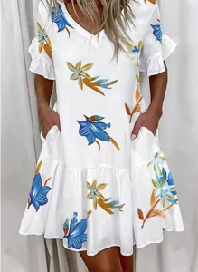 Detailed view of floral print V-neck short sleeve casual dress with ruffle hem