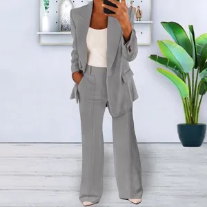 Detailed view of the elegant grey women slim cardigan suit jacket and matching trousers set.