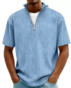 Detail view of men's light blue half-zip ribbed knit short sleeve polo t-shirt with texture.