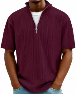 Close-up detail of men's burgundy ribbed quarter-zip short sleeve polo t-shirt texture.