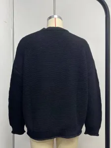 Black knit cardigan for women, loose casual sweater jacket, solid color daily wear detail.