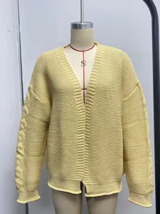 Yellow knitted cardigan featuring a casual V-neck design and stylish cable knit sleeve details.