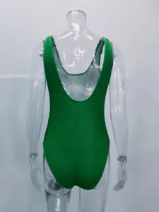 Green crinkle textured one-piece swimsuit for women, featuring a scoop back and stretchy fabric.