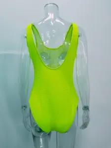 Neon green crinkle one-piece swimsuit women swimwear back view detail display high stretch.