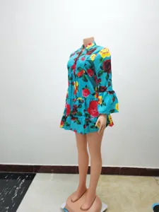 Teal floral print mini dress featuring a half-open collar and tiered bell sleeves.