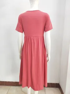 Back view detail of solid color short sleeve round neck gathered waist midi dress, casual style.