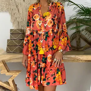 Boho floral print long sleeve tiered midi dress detail, casual vintage spring style.