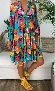 Vibrant floral print long sleeve tiered dress with retro V-neck design for daily chic look.