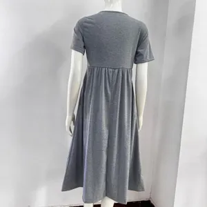 Grey short sleeve round neck pleated midi dress back view detail showing the fit and style.