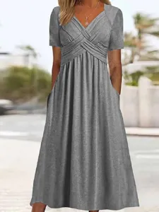 Elegant grey short sleeve V-neck midi dress with pleats and pockets for women daily wear.