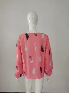 Women's pink long sleeve V-neck blouse featuring elegant feather print and loose fit casual style.