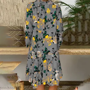 Close up back view of the vintage gray floral long sleeve tiered casual midi dress.