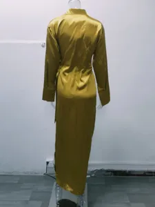 Detail view of the elegant long-sleeve lapel high-waist split satin jumpsuit in gold.