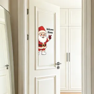 Macro detail showing a cartoon Santa Claus wall sticker applied on a white bedroom door