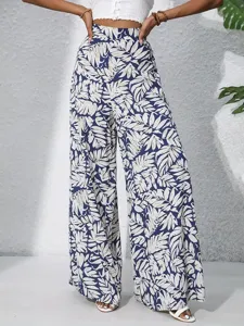 Tropical leaf print high waist wide leg pants for women summer vacation casual style.