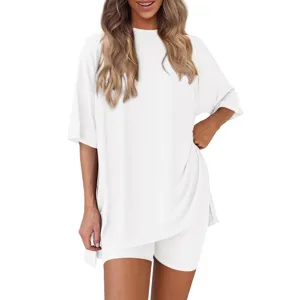 Solid color oversized short sleeve top and shorts lounge set detail view, relaxed casual style.