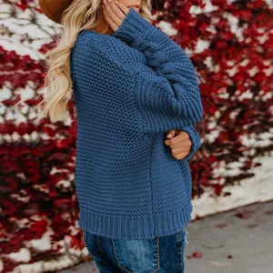 Women's blue chunky knit cardigan sweater casual long sleeve outerwear for autumn winter fashion.