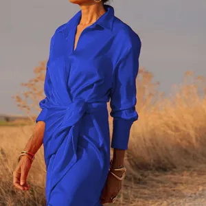 Elegant royal blue long sleeve lapel jumpsuit for women, high waist tied chic outfit.