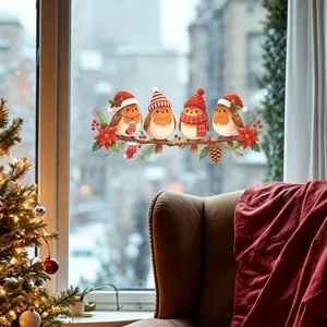 Christmas window stickers featuring four robins in hats and scarves on a pine branch