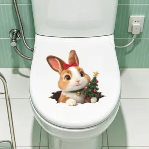 Detailed view of a 3D cute rabbit Christmas toilet sticker on a white seat lid